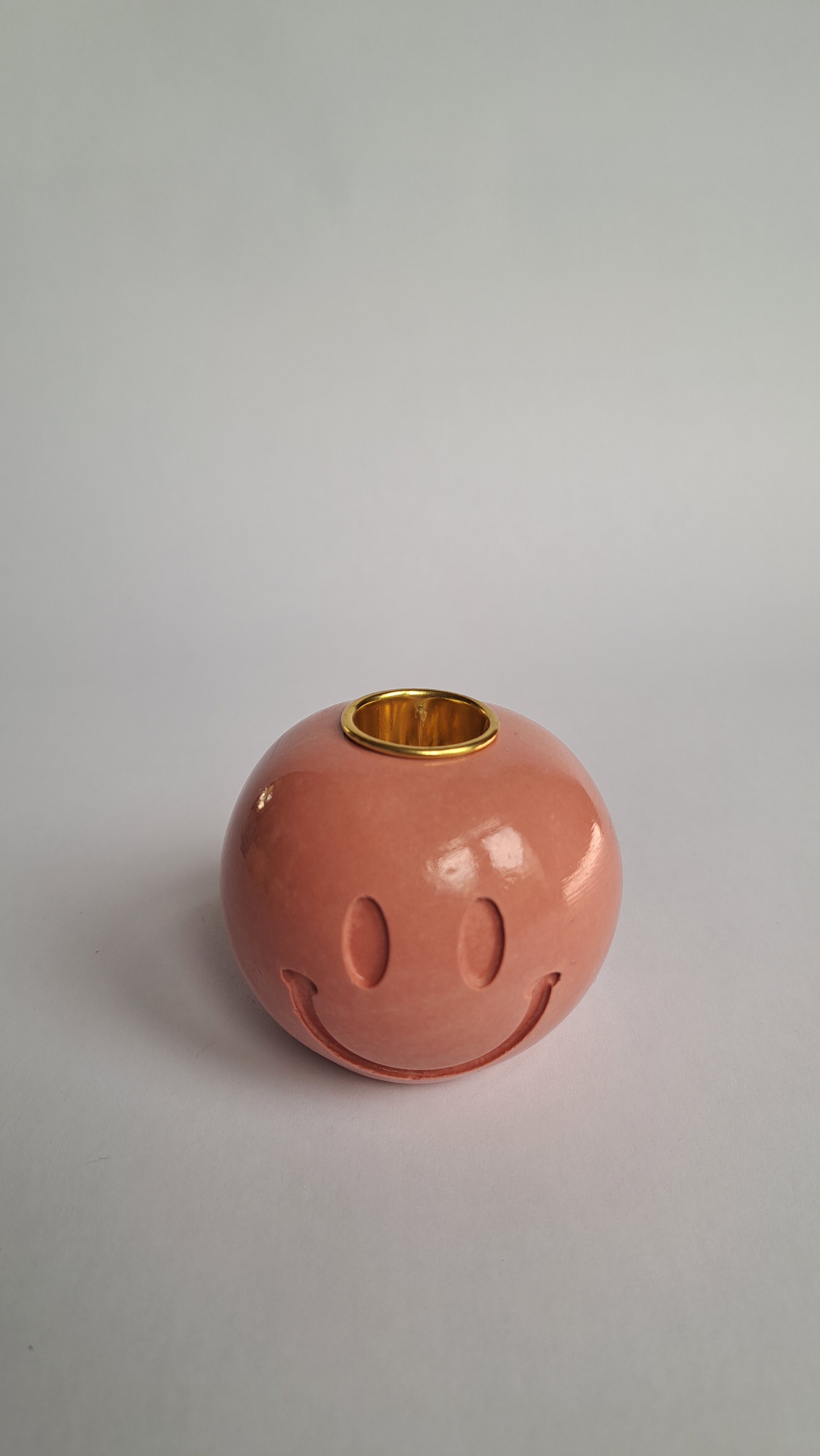 Kandelaar smiley aarderood