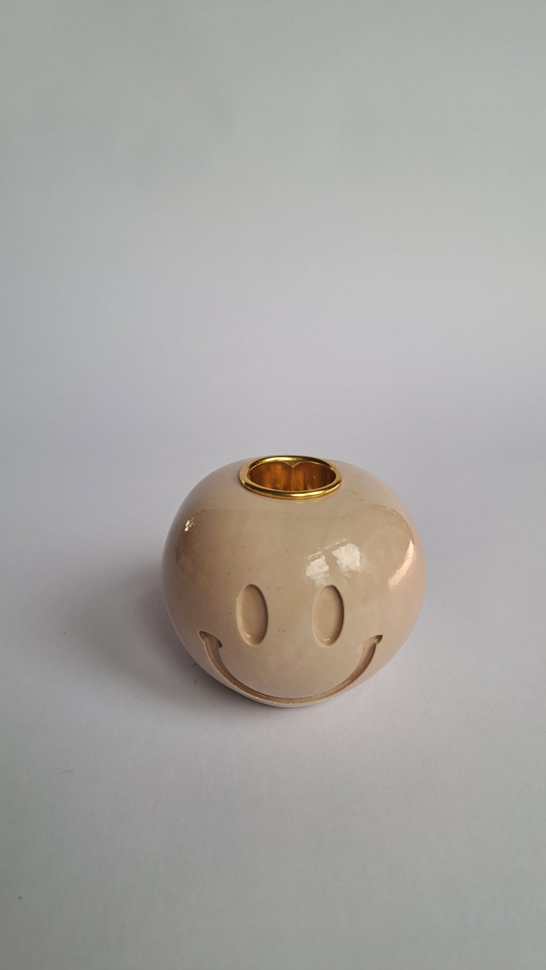 Kandelaar smiley taupe