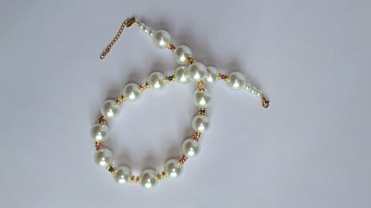 Chunky parelketting met gouden details